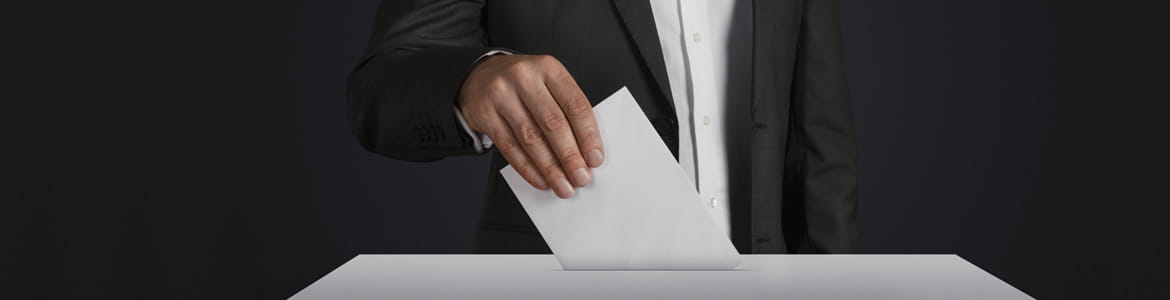 Vote being posted in ballot box